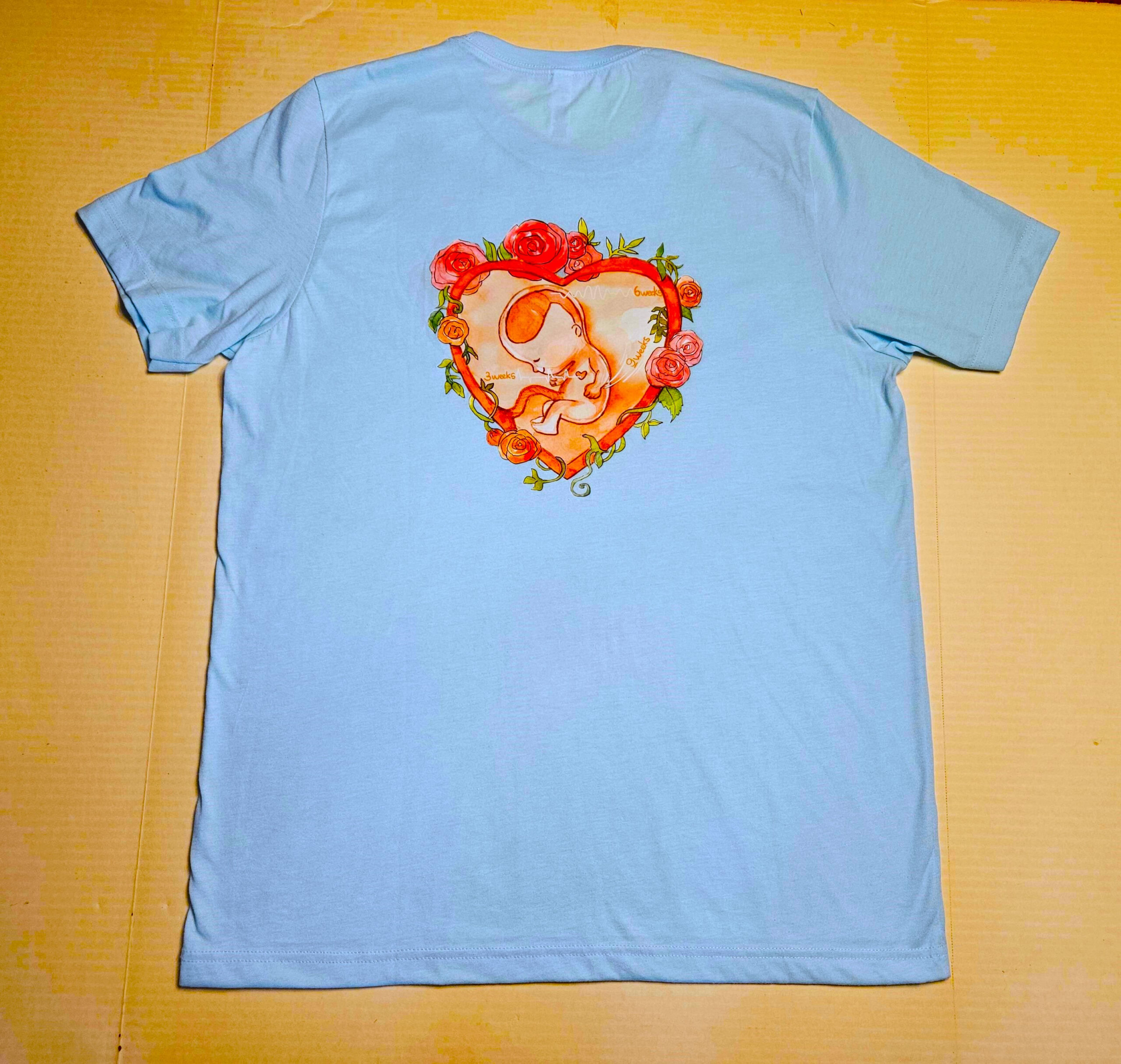 T-shirt - Light Blue With Gold Lettering